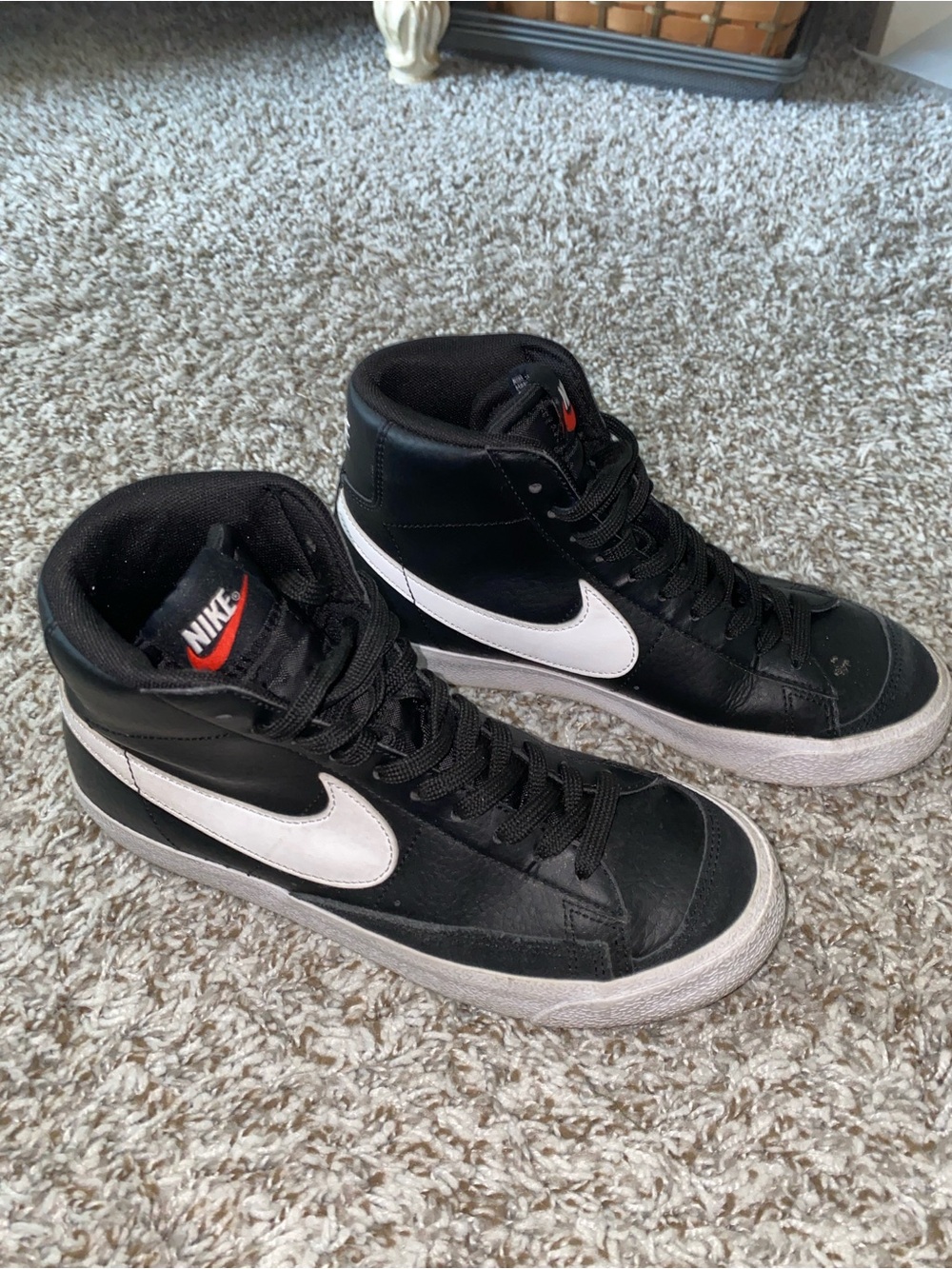 Nike Black & White High-Top Sneakers with Red Tongue Logo